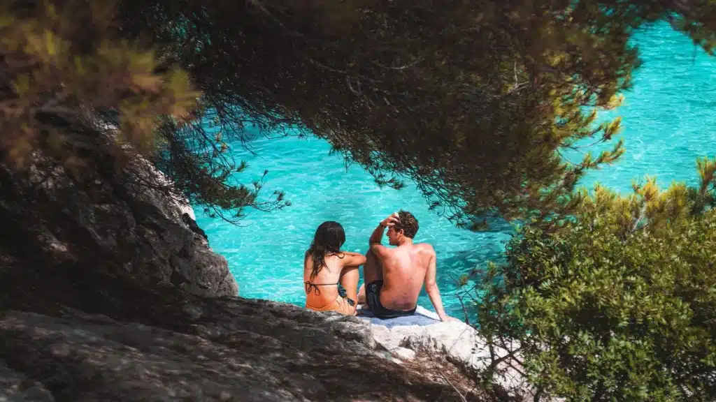 young couple enjoying the sea and sun in Corfu